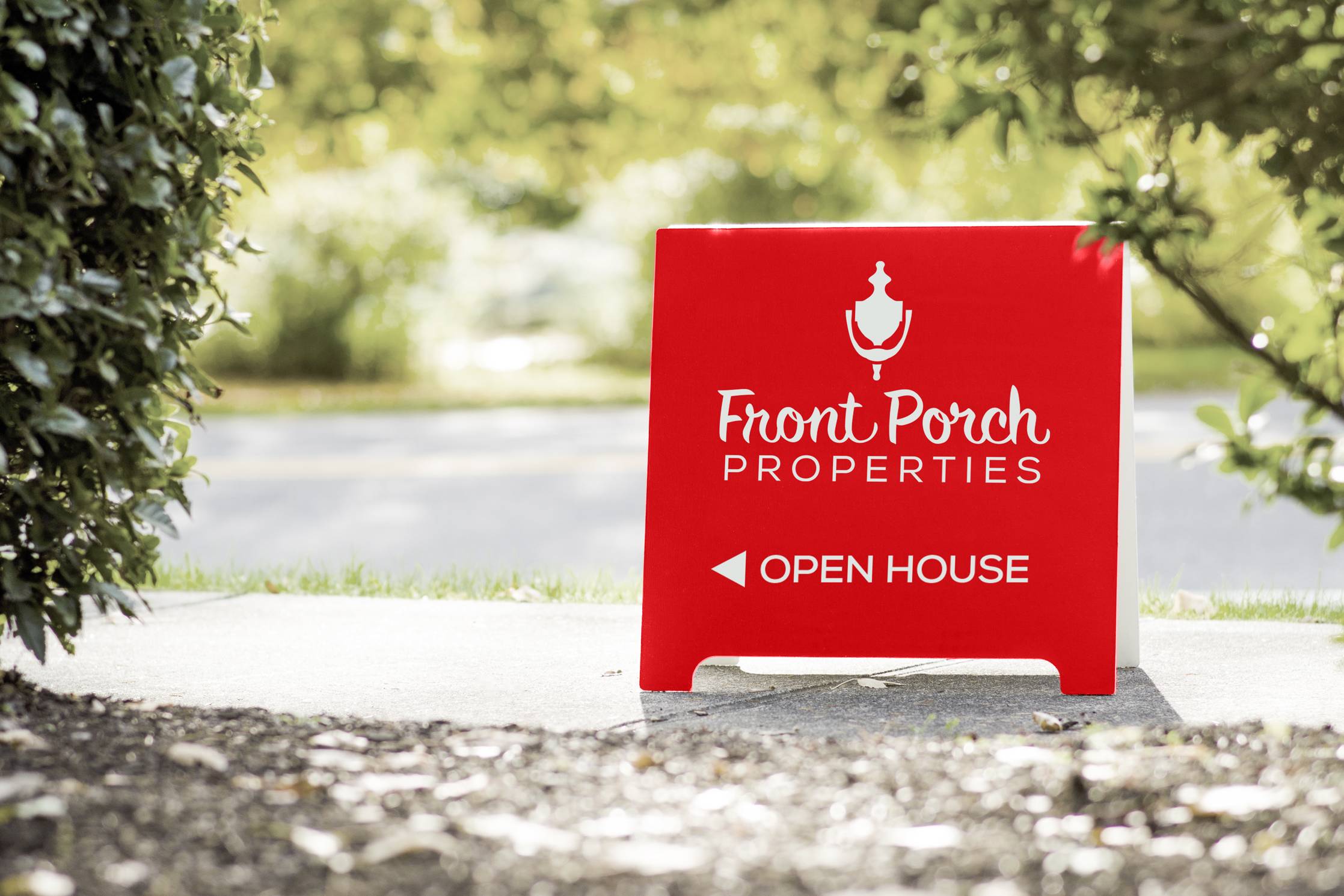 Front Porch Properties logo on a red open house sign
